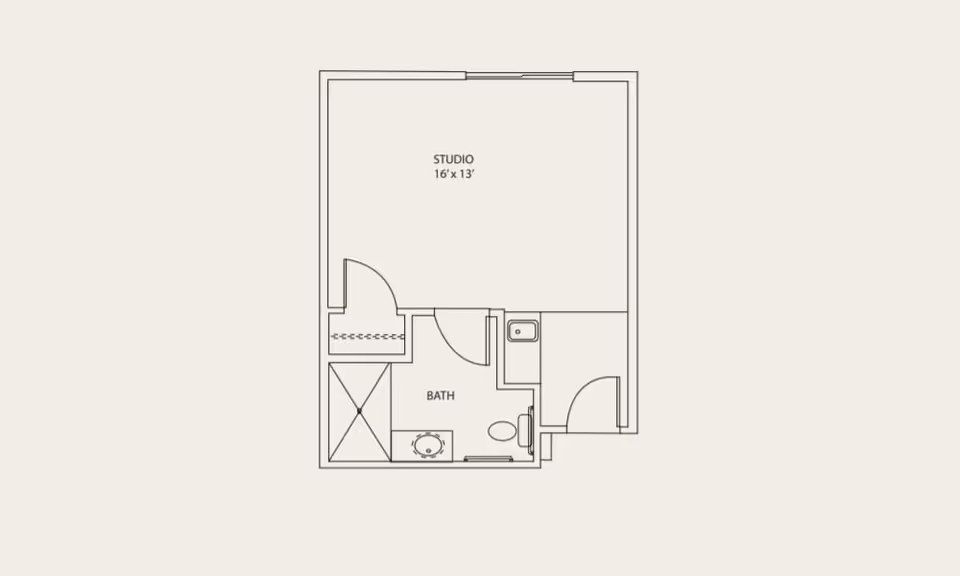 Floor plan of a studio apartment measuring 16 feet by 13 feet, including a bathroom with a shower, sink, and toilet, and a small closet area.