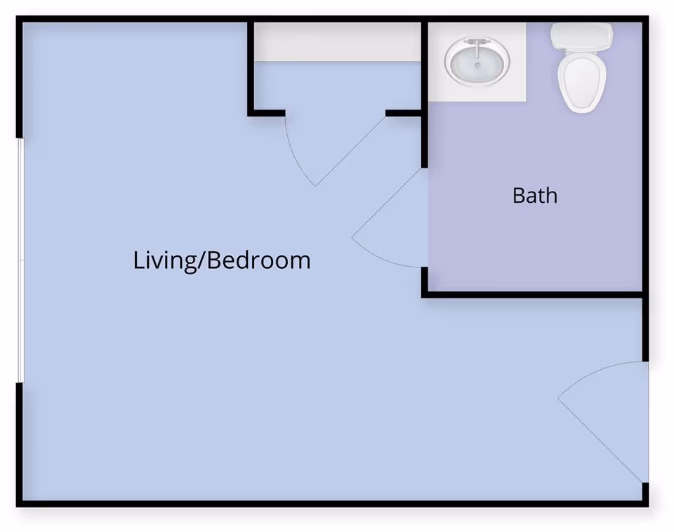 Floor plan showing a combined living and bedroom area with an attached bathroom that includes a sink and toilet.