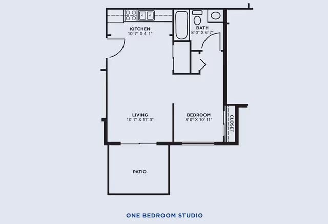 Black-and-white floor plan of a one-bedroom studio showing a kitchen, bath, living area, bedroom with closet, and a patio.