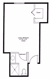 Black and white architectural floor plan of a studio apartment with a combined living and bedroom area measuring 13 feet 10 inches by 18 feet, a closet in the top right corner, and a bathroom in the bottom left corner containing a shower, toilet, and sink.