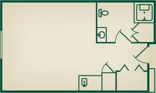 A simple architectural floor plan showing a layout with a bathroom area including a toilet and sink, an entry area with doors, and an open larger room space.