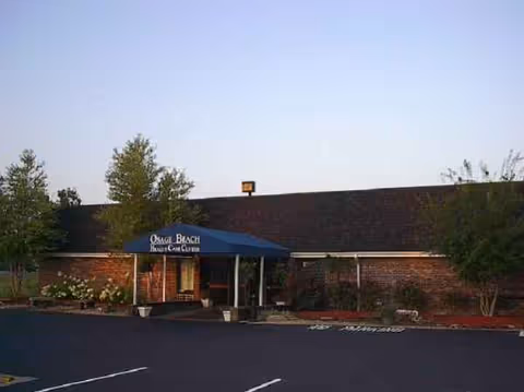 Front exterior of Osage Beach Rehab & Health Care Center with blue canopy entrance