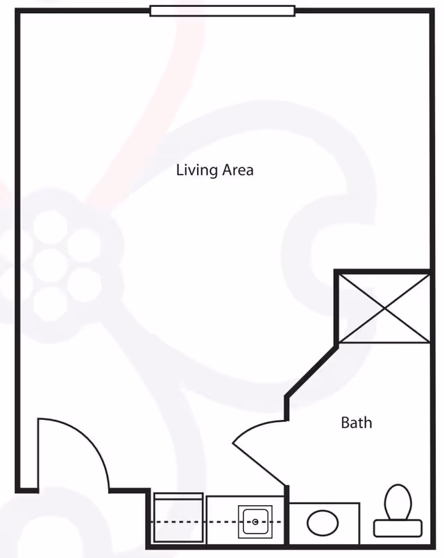 Floor plan of a studio unit showing a living area, entry, small kitchenette/utility area and a labeled bathroom with toilet and shower.