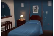 Small bedroom with a single bed dressed in blue bedding, a nightstand with a lamp, a wooden chair, and a framed picture on teal walls.