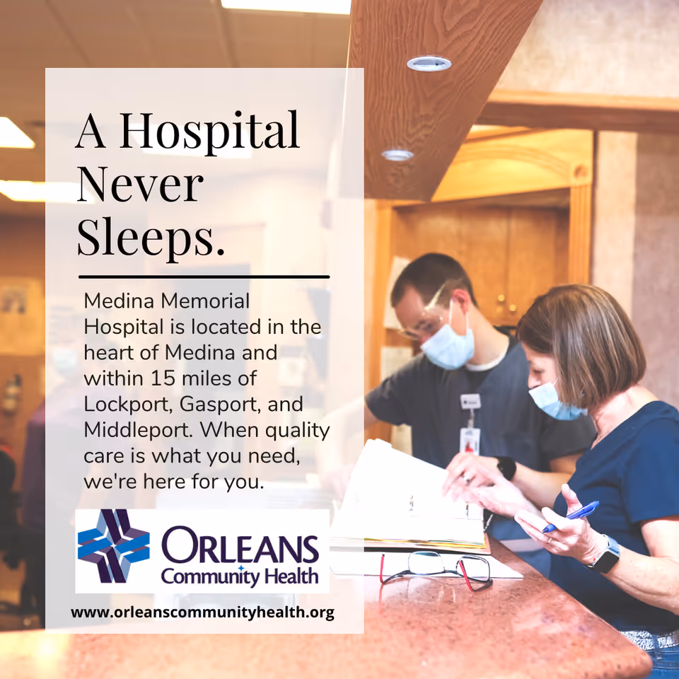 Two healthcare workers wearing masks and scrubs are reviewing documents at a hospital reception desk. The image includes a text overlay promoting Medina Memorial Hospital, part of Orleans Community Health, highlighting its location and commitment to quality care.