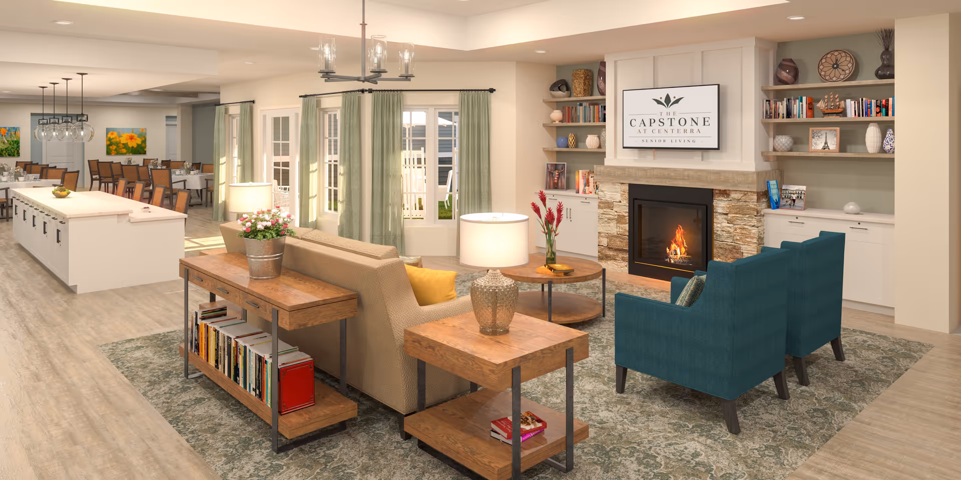 Spacious senior living common area with sofas and armchairs arranged around a fireplace, bookshelves, and dining tables visible in the background.