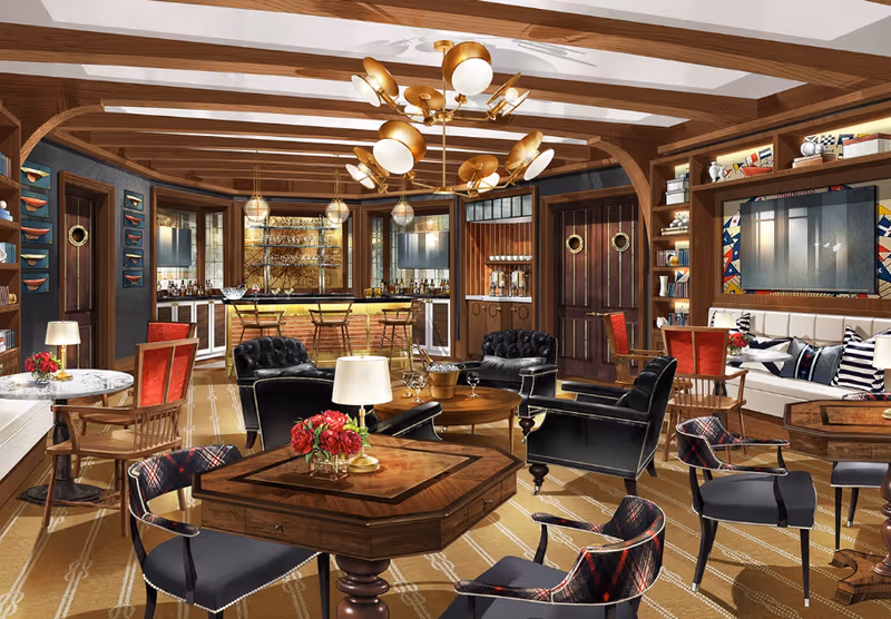 Luxurious communal lounge with multiple seating areas, a central table, and a bar in the background under decorative lighting.