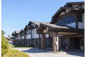 Exterior view of Lakeview Lodge Assisted Living at Friendship Village with covered entrance.