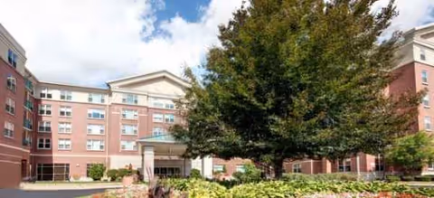 Brookdale Southfield exterior: brick multi-story building with entrance canopy and surrounding landscaping.