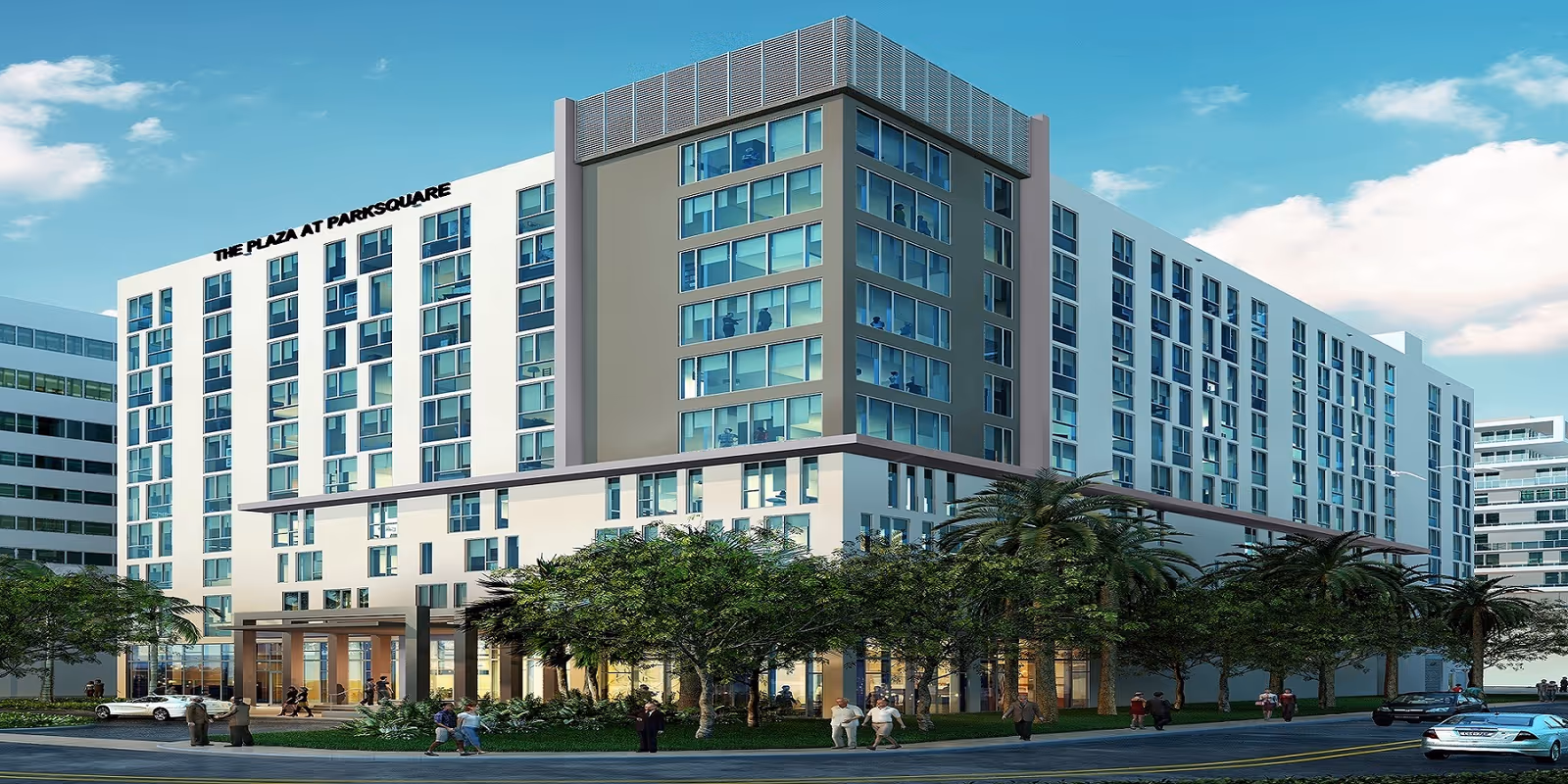 A modern multi-story senior living building with palm trees and people entering the front entrance.
