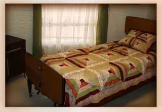 A cozy bedroom with a wooden bed, patchwork quilt, and dresser beside a window.