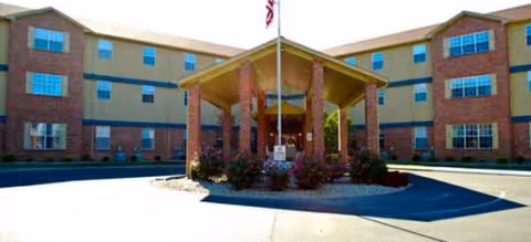 Front entrance of Brookdale Murray senior living building with a covered portico