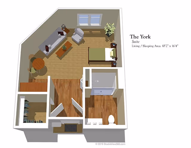 3D floor plan of a studio apartment labeled "The York Suite" showing a bed, seating area, small dining table, bathroom and closet.