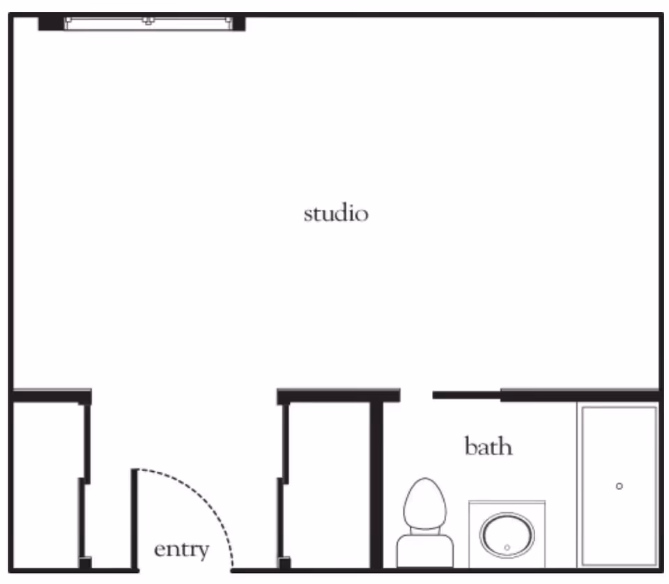 Floor plan layout of a studio apartment with an entry area, a main studio living space, and a bathroom that includes a toilet, sink, and shower.