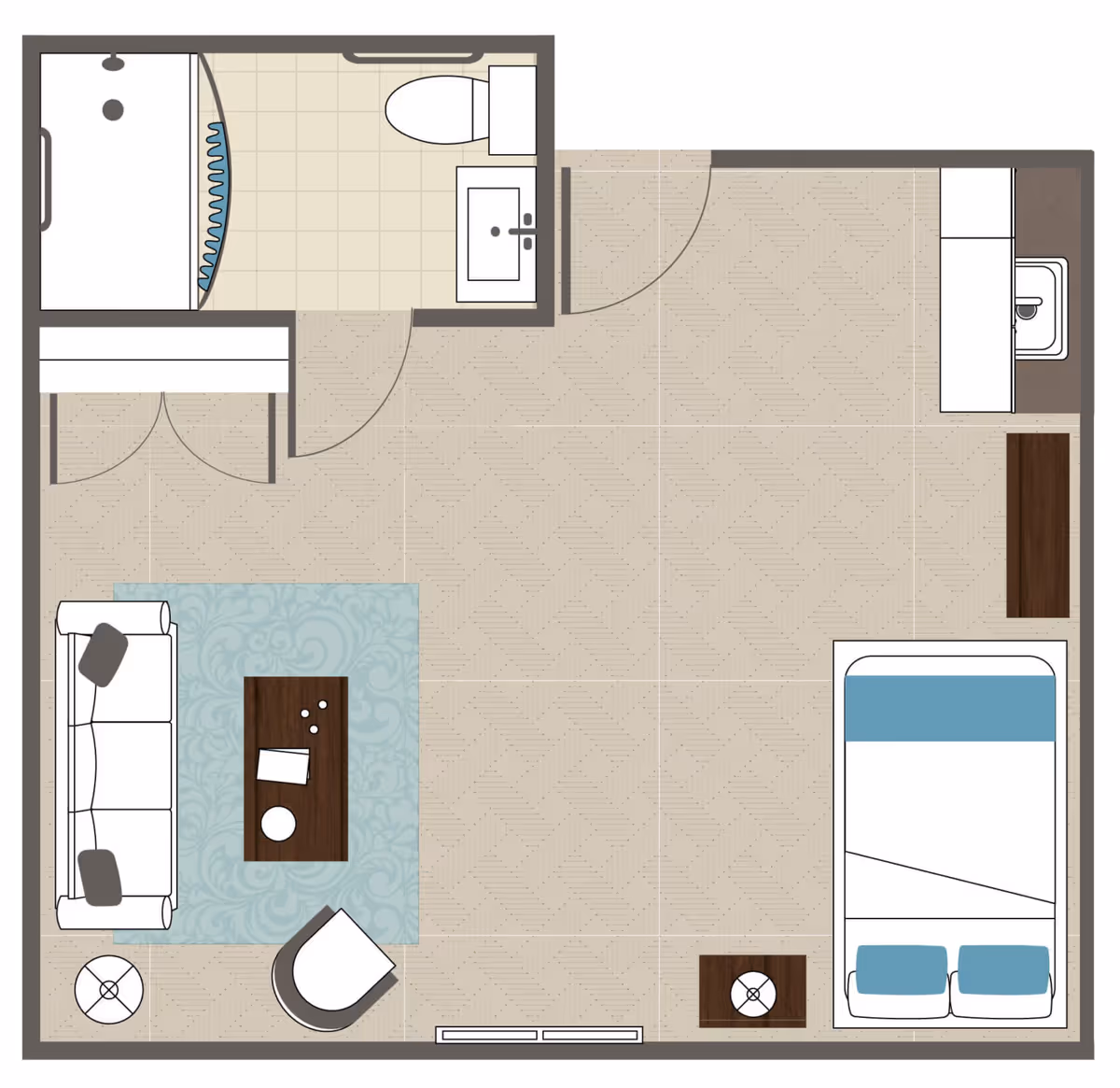 Floor plan of a studio apartment with a bathroom, living area with sofa, chair, coffee table, and rug, a sleeping area with a bed and nightstand, and a small kitchenette with a sink and counter space.