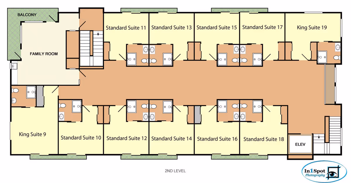 Floor plan of the second level of Wilson Senior Living facility showing a central hallway with multiple suites labeled as Standard Suites and King Suites, a family room with a balcony, staircases, and an elevator.