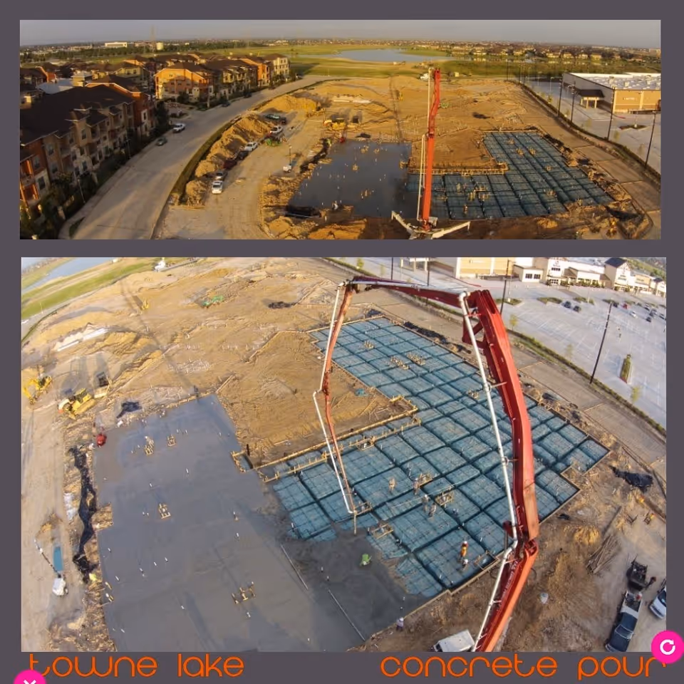 Aerial view of a construction site showing concrete slabs being poured and a large red concrete pump arm.