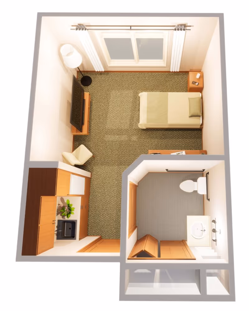 Top-down view of a small studio apartment layout with a single bed, nightstand, TV on a stand, armchair, kitchenette with cabinets and a sink, and a separate bathroom with a toilet and sink.