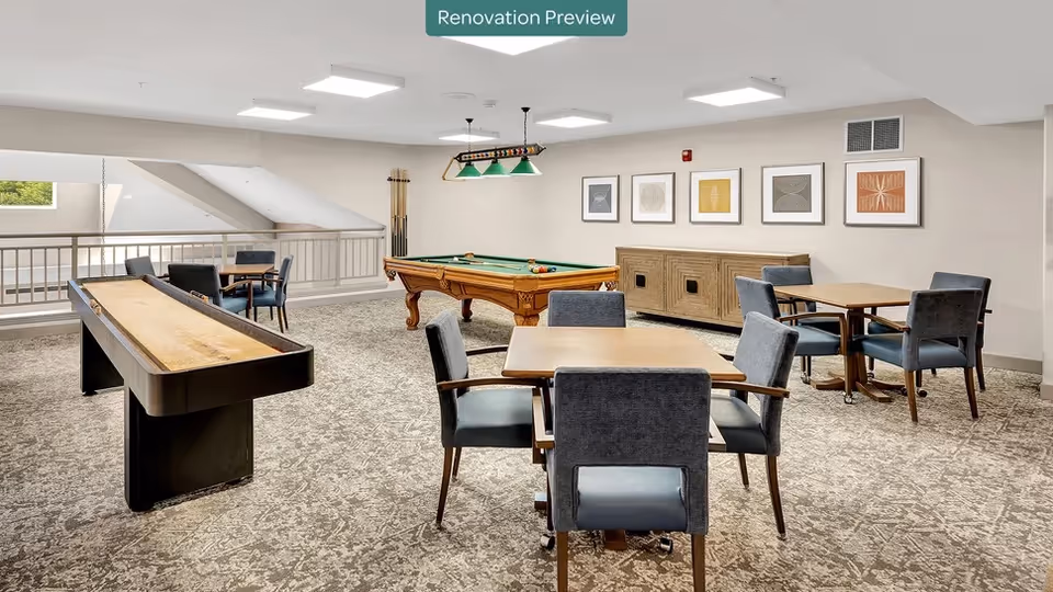 Community game room with a pool table, shuffleboard table, and multiple card tables and chairs.
