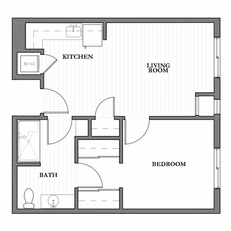 Architectural floor plan of an assisted living unit showing a kitchen, living room, bedroom, and bathroom with labeled rooms and fixtures.
