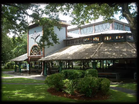 Exterior view of Windemere Nursing and Rehab Center on Martha's Vineyard with outdoor patio and trees.