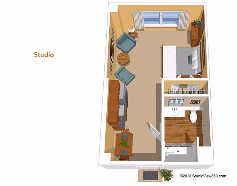 3D floor plan of a studio apartment featuring a combined living and sleeping area with a bed, two armchairs, a round table, a dresser, and a window with curtains. The kitchen area includes cabinets, a refrigerator, and a small dining table with a plant. The bathroom has a sink, toilet, and shower. The floor plan is labeled 'Studio'.