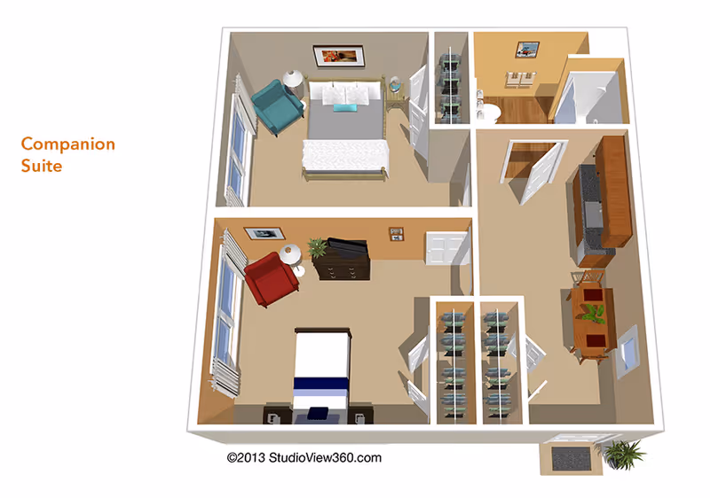 3D floor plan of a companion suite showing two bedrooms, each with a bed, chair, and nightstand. The suite includes a shared bathroom and a kitchen area with a dining table and chairs. There are closets between the bedrooms and a small entryway with a plant.