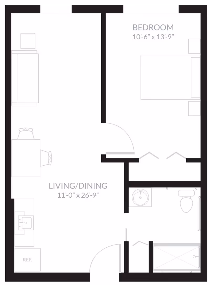 Floor plan of a one-bedroom apartment at Laurel Glen at Sugar Land, showing a bedroom measuring 10 feet 6 inches by 13 feet 9 inches, a combined living and dining area measuring 11 feet by 26 feet 9 inches, a kitchen area with a refrigerator and sink, and a bathroom with a sink, toilet, and bathtub.
