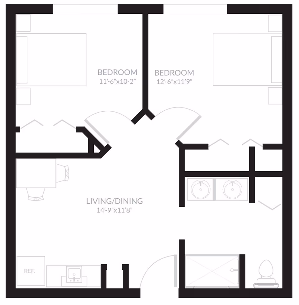 Floor plan layout of an apartment unit with two bedrooms, a combined living and dining area, a kitchen with a refrigerator and sink, and a bathroom with a shower, toilet, and double sinks.