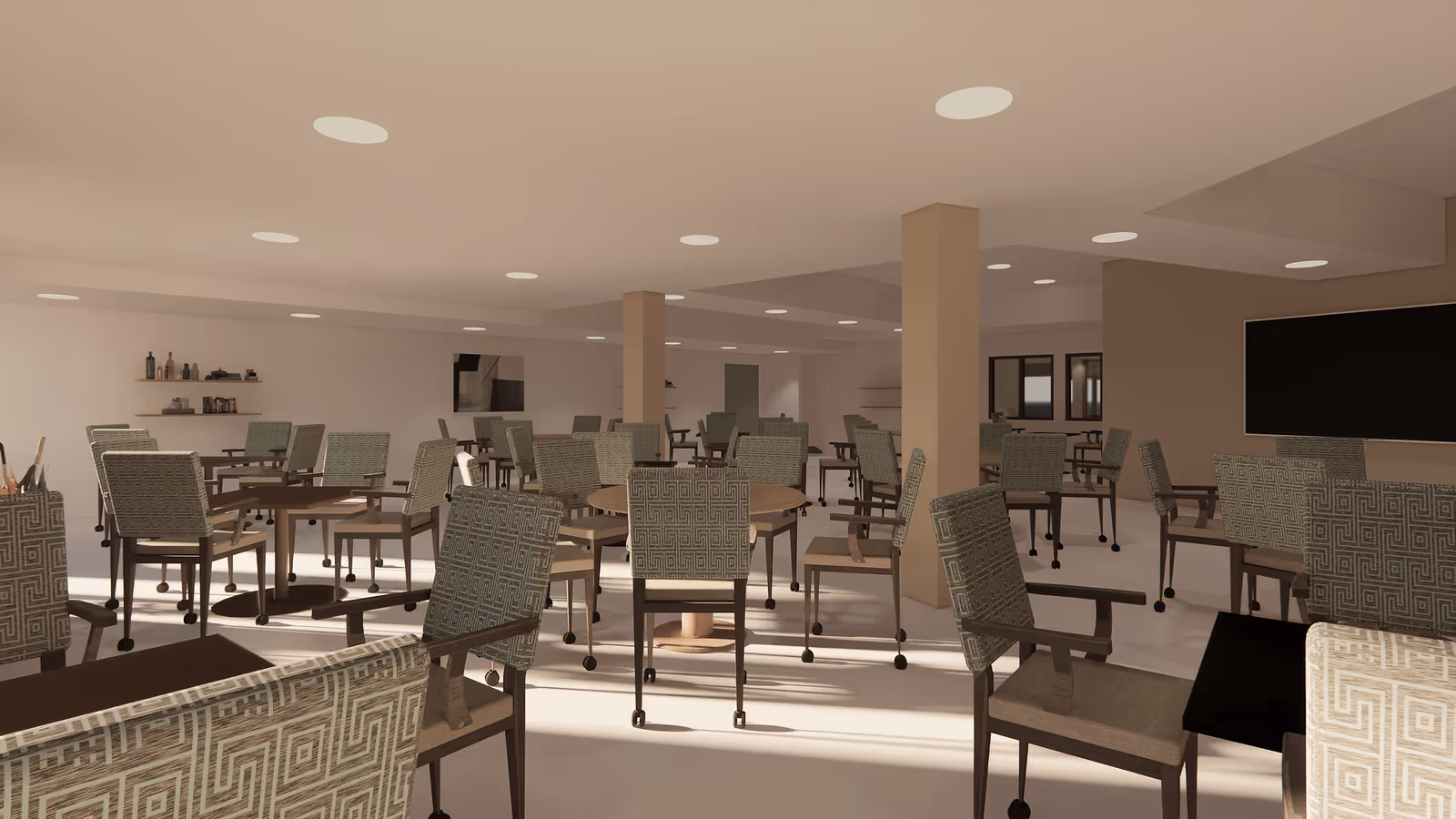 Spacious dining room with multiple round tables and patterned chairs under recessed ceiling lights.