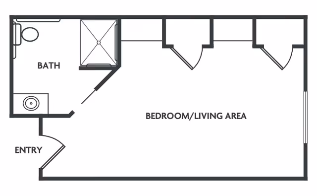 Floor plan of a living space at Emory Ridge showing an entry area leading into a combined bedroom and living area. To the left of the entry is a bathroom with a toilet, sink, and shower.