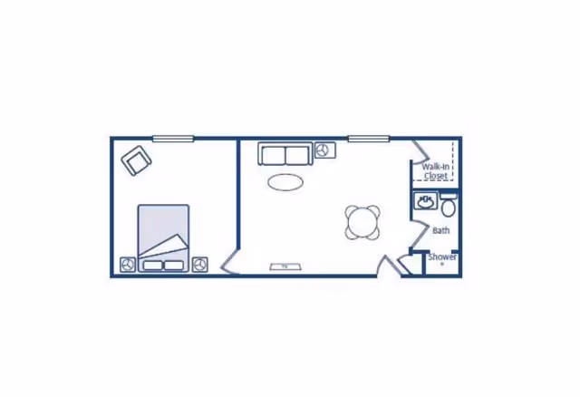 Floor plan of a small apartment unit showing a bedroom with a bed and chair, a living room with a sofa, coffee table, and chair, and a bathroom with a walk-in closet, bath, toilet, and shower.