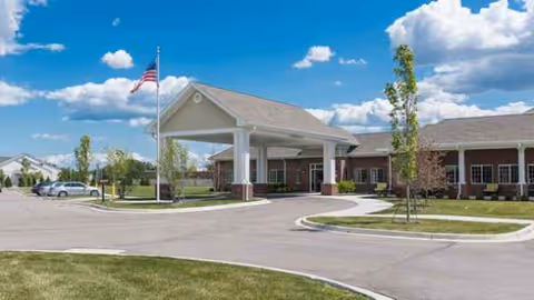 Exterior view of Optalis Health & Rehabilitation facility showcasing front entrance and driveway.