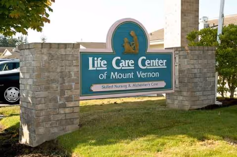 Outdoor view of the Life Care Center of Mount Vernon sign at the facility entrance.
