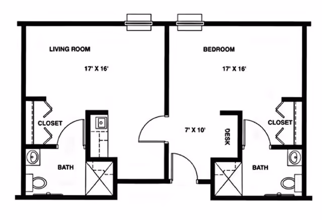 Black and white architectural floor plan showing a layout with a living room, bedroom, two bathrooms, closets, and a desk area. The living room and bedroom each measure 17 by 16 feet. The floor plan includes labeled areas for closets and bathrooms with fixtures.