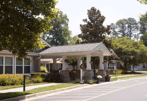 Sunrise of Richmond exterior shows a single-story building with a covered entrance.