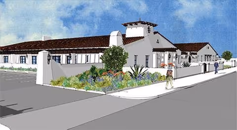 Architectural rendering of a low‑rise white stucco building with red tile roof, landscaped courtyard, and people walking along the sidewalk.