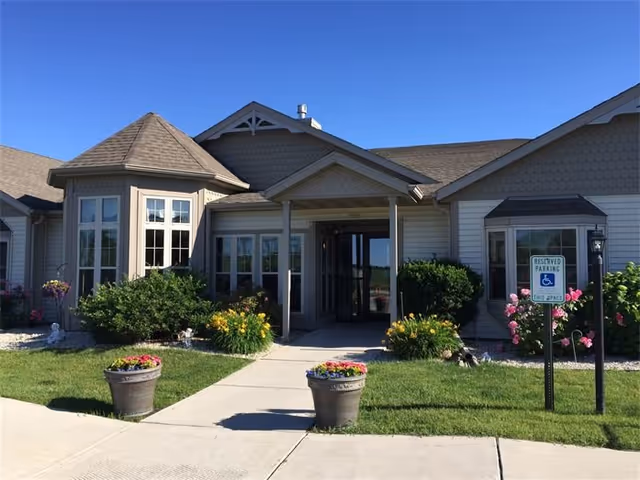 Exterior view of Cedar Grove Gardens II entrance with landscaping