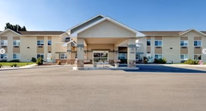 Exterior view of Blossom Valley by Cogir senior living building entrance.