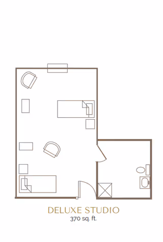 Floor plan of a deluxe studio apartment measuring 370 square feet, showing a main living and sleeping area with two beds, chairs, and small tables, and a separate bathroom with a toilet and sink.