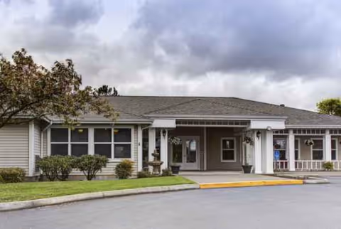 Exterior view of Trustwell Living at Davenport Place showing a single-story building entrance.