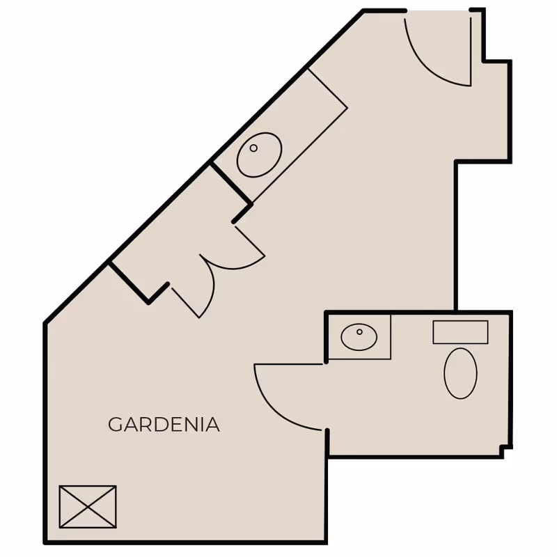 Floor plan labeled Gardenia showing a layout with a main room, a bathroom with a toilet and sink, and additional closet or storage spaces.