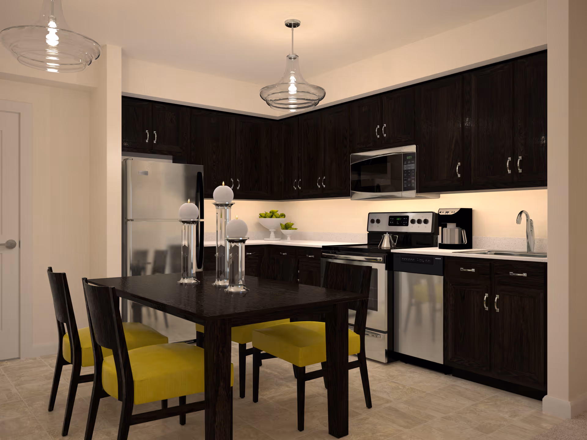Modern kitchen with dark wood cabinets, stainless steel appliances and a dining table with yellow chairs.