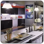 Open kitchen with a large island and sink, pendant lights, dark cabinets, a white dishwasher, and a stainless refrigerator.