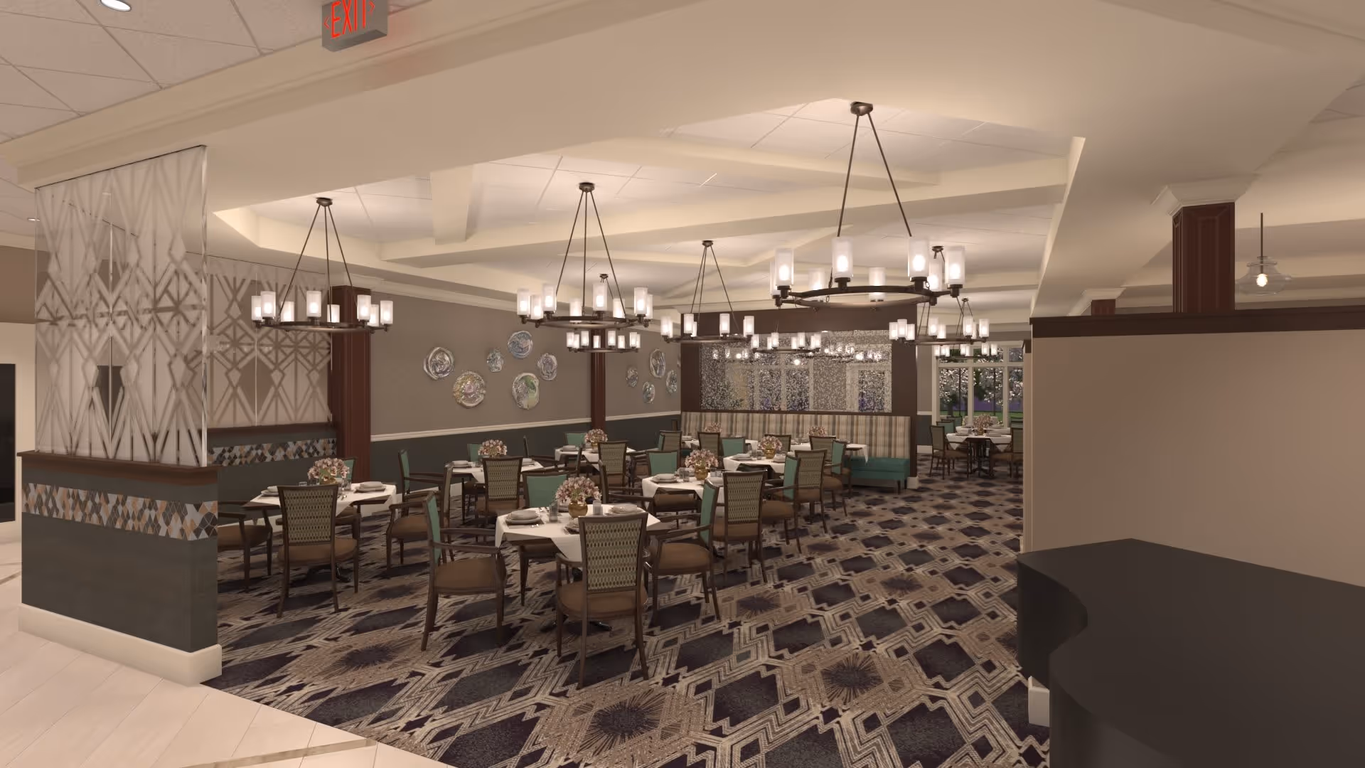 A spacious dining room with multiple round tables covered with white tablecloths, each set with plates, napkins, and floral centerpieces. The room features patterned carpet flooring, modern chandeliers hanging from the ceiling, decorative wall plates, and a partial room divider with geometric designs.