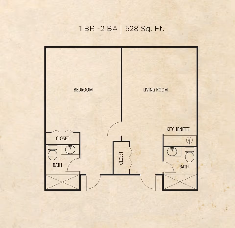 Floor plan of a 1 bedroom, 2 bathroom apartment with 528 square feet. The layout includes a bedroom with a closet and bathroom, a living room with a kitchenette, another bathroom, and a closet in the hallway.