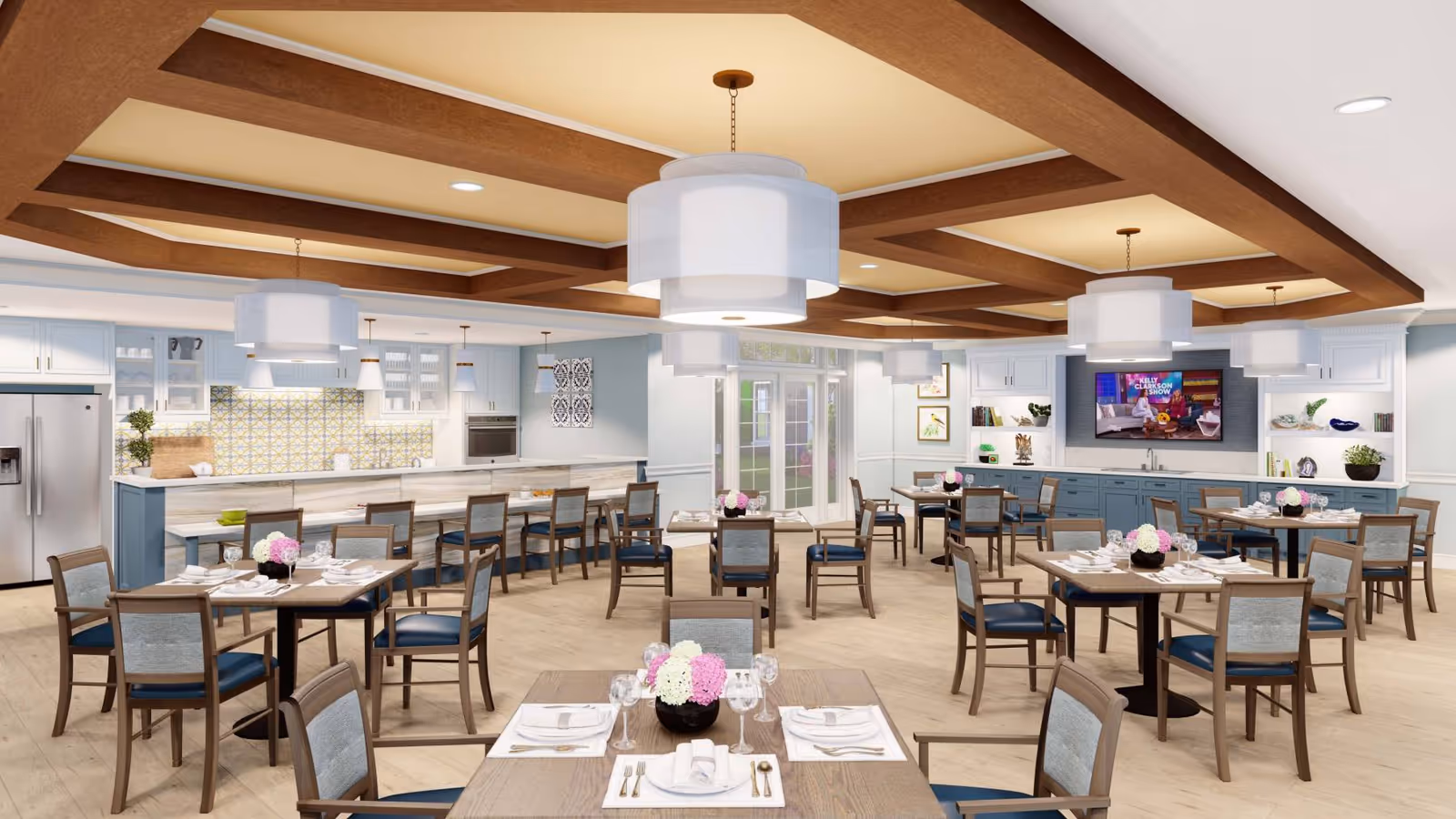Spacious dining room with multiple set tables and chairs, a long kitchen counter with bar stools, pendant lights, and a TV on the far wall.