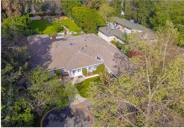 Aerial view of Jackie's Hideaway A, a single-story senior living facility among trees.