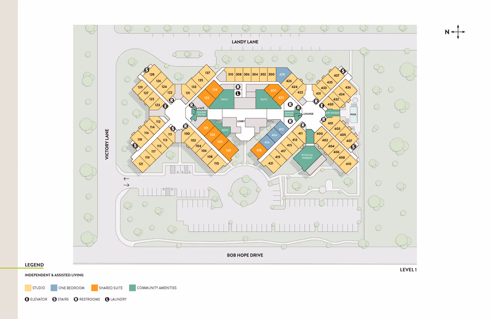 Floor plan of Atria Rancho Mirage senior living facility showing layout of rooms and community amenities on Level 1. The plan includes studio, one-bedroom, and shared suite units, marked in different colors. Community amenities such as cafe, dining room, lounge, art studio, physical therapy, and pool are highlighted. The map also shows elevators, stairs, restrooms, and laundry areas, with surrounding streets labeled as Landy Lane, Victory Lane, and Bob Hope Drive.