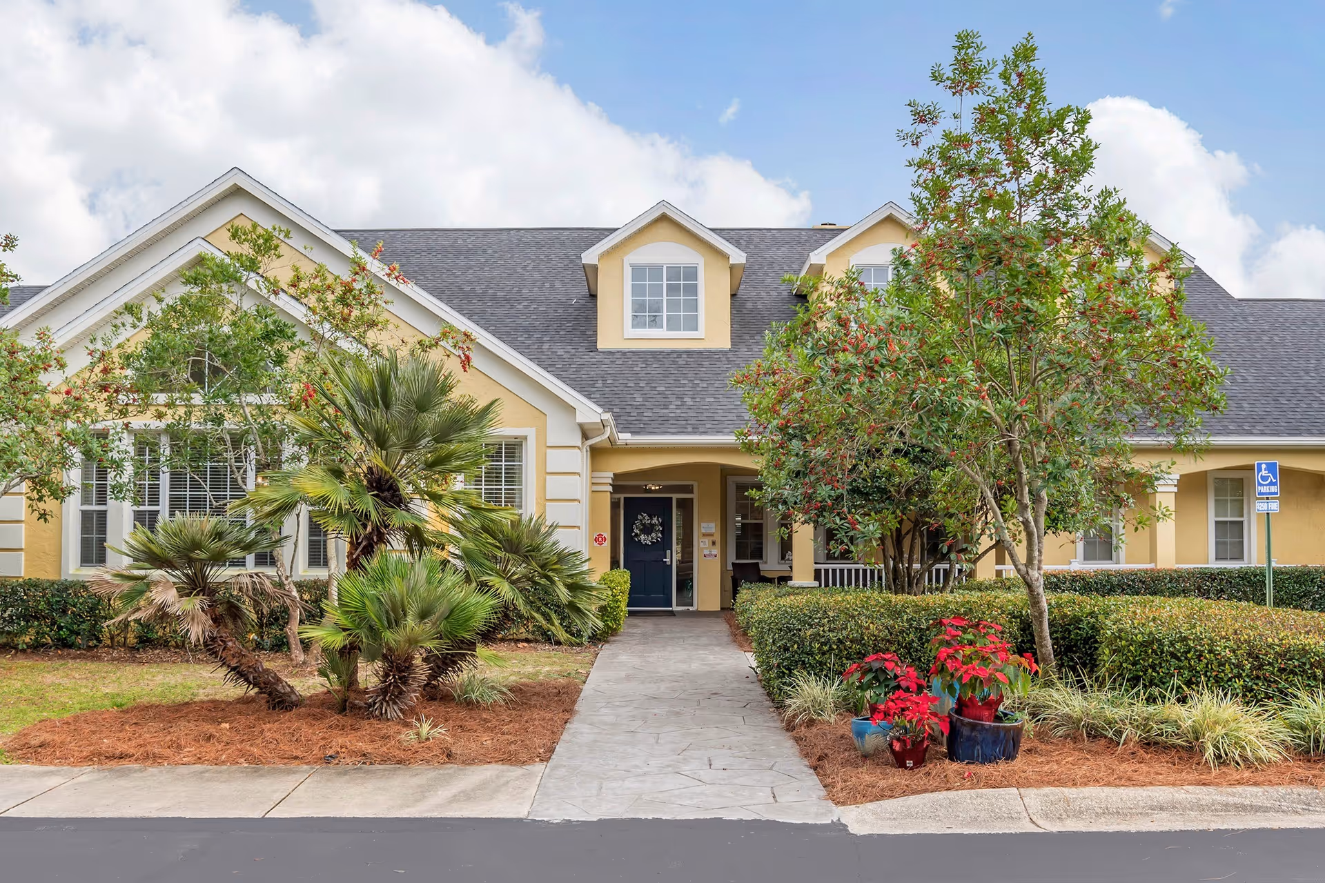 Front exterior view of The Opal at Bluewater Bay senior living facility.